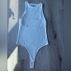 New white Gaze bodysuit.